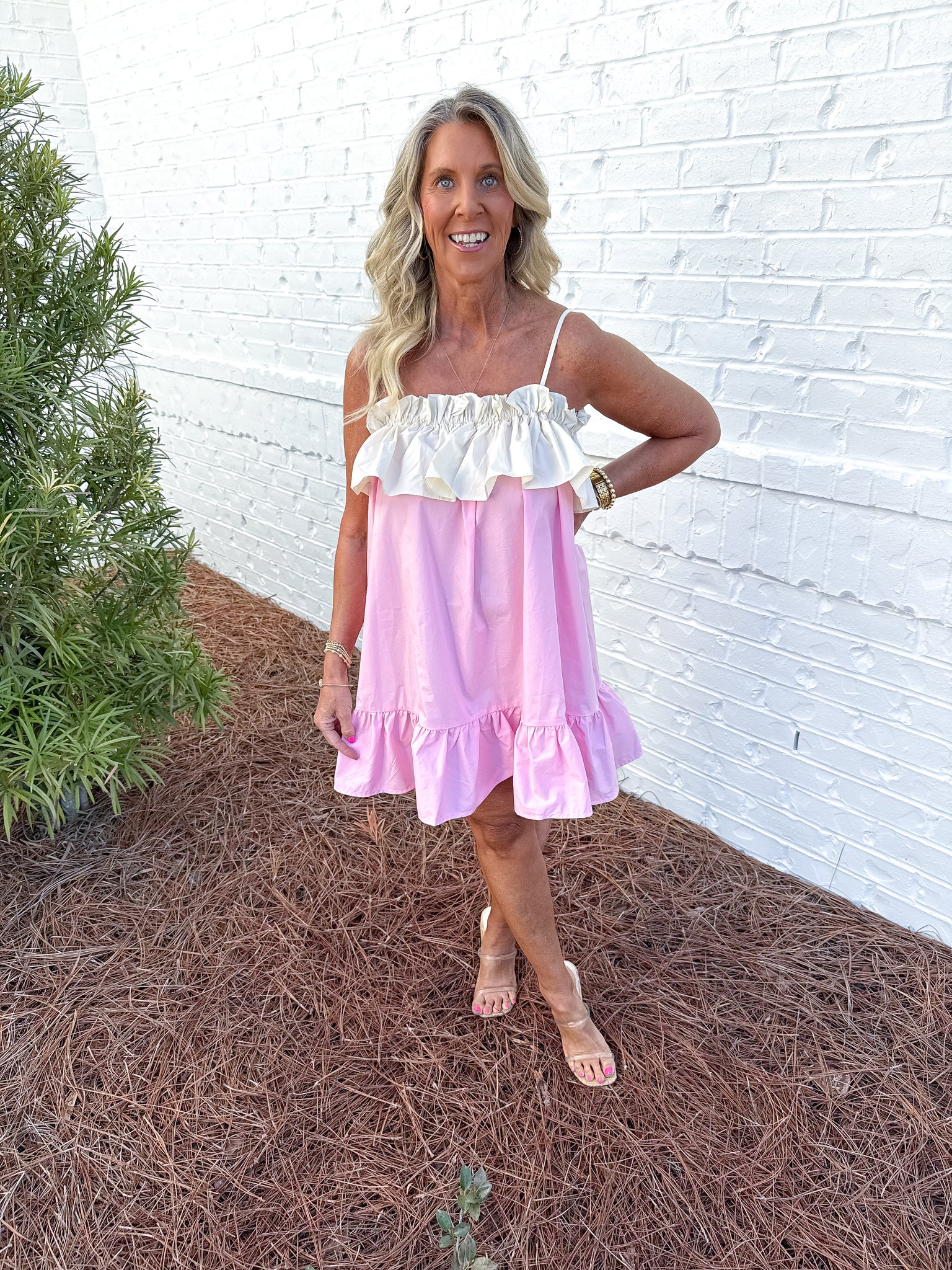 pink frilly dress Sassy Shortcake Ready To Ruffle 100% Polyester Cold delicate machine wash turned inside out with like colours Do not bleach Do not soak Do not rub Warm steam iron inside out to original shape Do not dry clean Please refer to swatch image for most accurate colour Pink Frill V Neck Ruffle